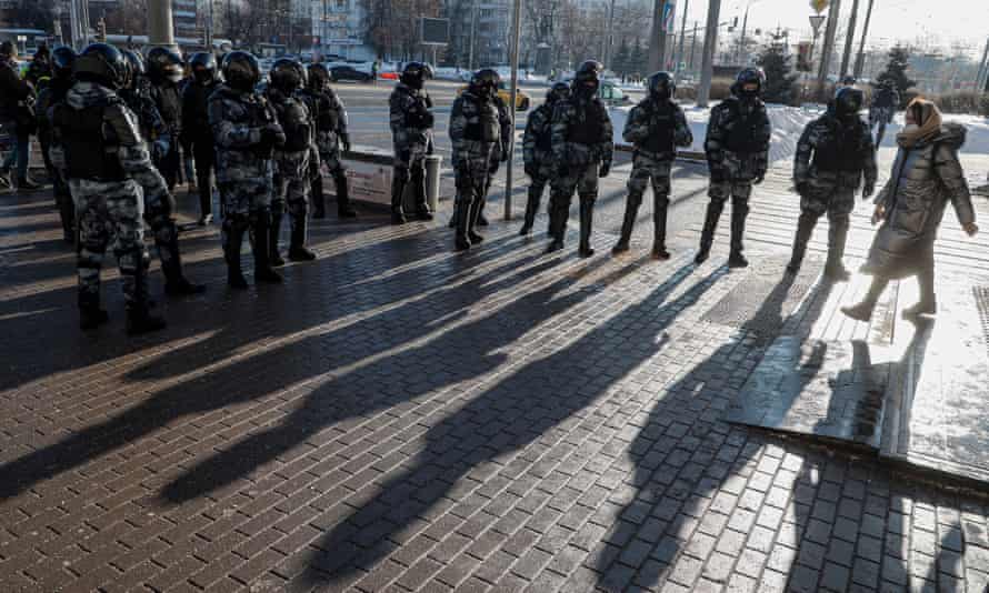 Russian police stand near the Moscow city court on Tuesday.