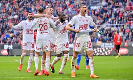 Brest players celebrate after beating Rennes.