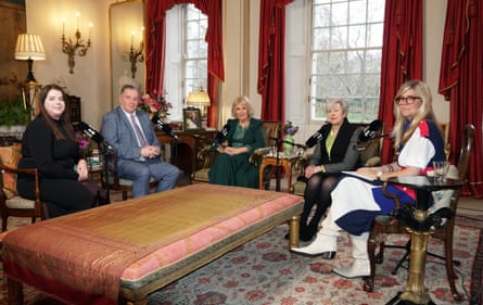 Queen Camilla with Amy Hunt, John Hunt, Theresa May and Emma Barnett in the Garden Room of Clarence House, London