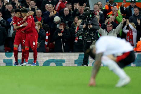 Liverpool’s Roberto Firmino celebrates scoring their second goal with Luis Diaz.
