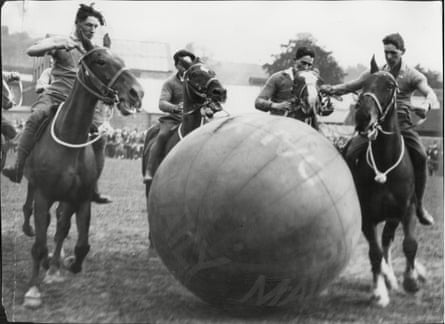 Artillerymen enjoy a game of pushball on horseback at the 1927 Leek Carnival in Staffordshire.