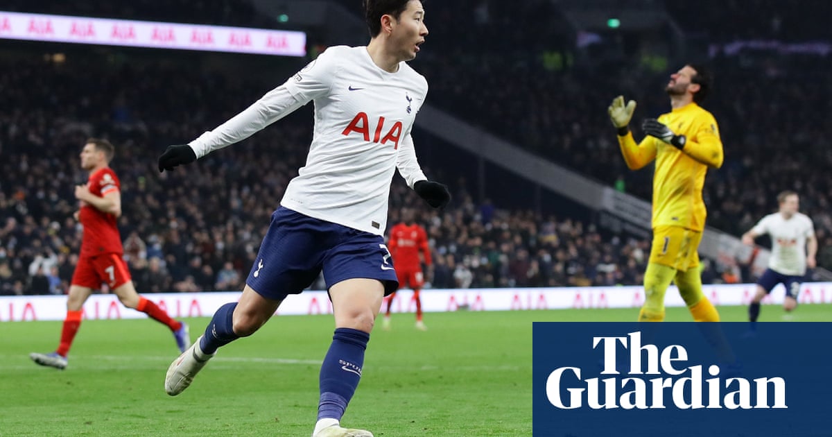 Son earns Tottenham point in thrilling draw with 10-man Liverpool