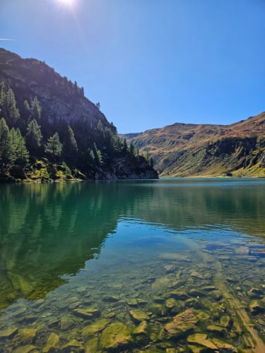Tappenkarsee, Austria ‘The still water of the lake while out hiking in early autumn.’