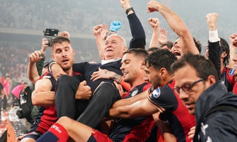 Claudio Ranieri is lifted in the air by his players after leading Cagliari to promotion.