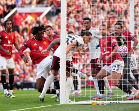 Arsenal’s Riccardo Calafiori (centre) celebrates scoring their side’s first goal of the game during the Premier League match at Old Trafford, Manchester.