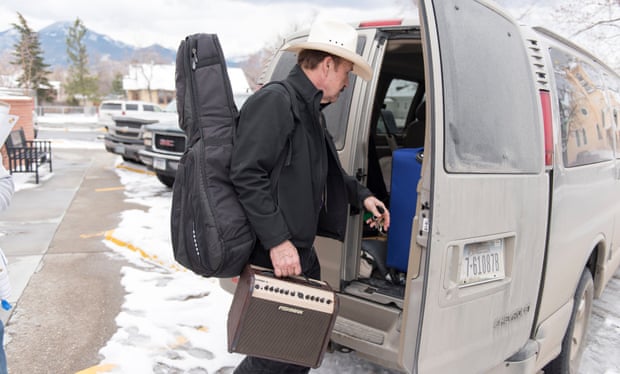 Democrat Rob Quist loads his guitar and amp into his van after a campaign stop in Livingston, Montana.