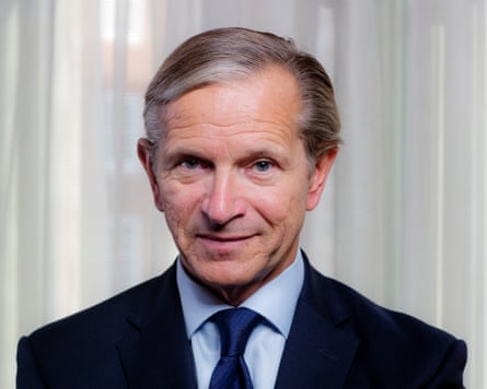 Marc Bolland in jacket and tie