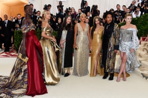 Fashion power squad Alek Wek, Jasmine Sanders, Valerie Messika, Kiersey Clemons, Olivia Munn, Luka Sabbat, and Lili Reinhart join forces on the Met Gala red carpet.