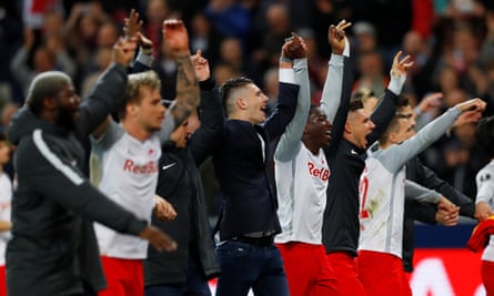 Salzburg players celebrate after the final whistle, having sealed a semi-final place in dramatic fashion.