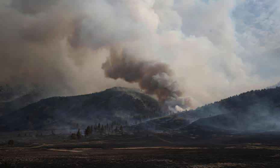 Smoke rises up from the Brattain fire as trees burn in the Fremont national forest in Paisley, Oregon, in September 2020. 
