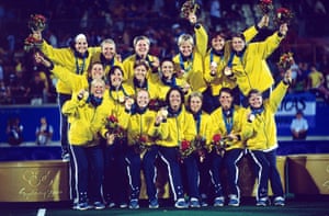 The Australian Hockeyroos posing with gold medals