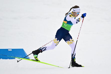 Sweden’s Ebba Andersson continues with one ski
