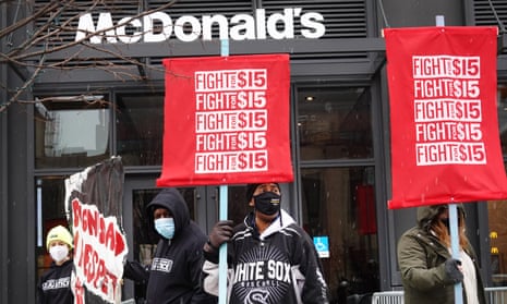 Demonstrators protest outside of McDonald’s corporate headquarters in Chicago.