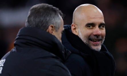 Pep Guardiola celebrates after beating Luton