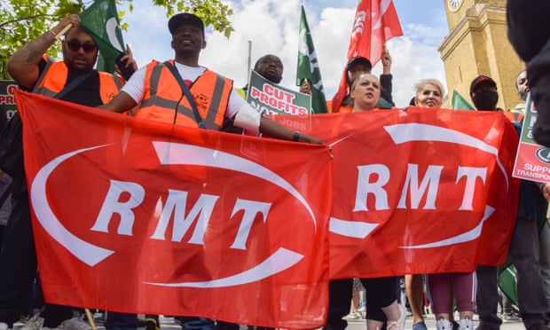 RMT members rally at London’s King’s Cross Station last month.