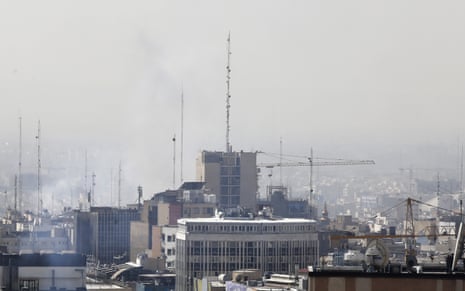 Smoke can be seen amid buildings in Tehran