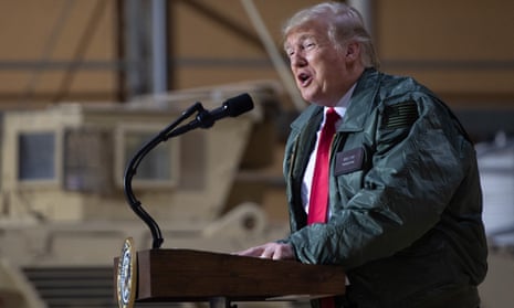 US-IRAQ-POLITICS-TRUMP-diplomacy<br>US President Donald Trump speaks to members of the US military during an unannounced trip to Al Asad Air Base in Iraq on December 26, 2018. - President Donald Trump arrived in Iraq on his first visit to US troops deployed in a war zone since his election two years ago (Photo by SAUL LOEB / AFP)SAUL LOEB/AFP/Getty Images