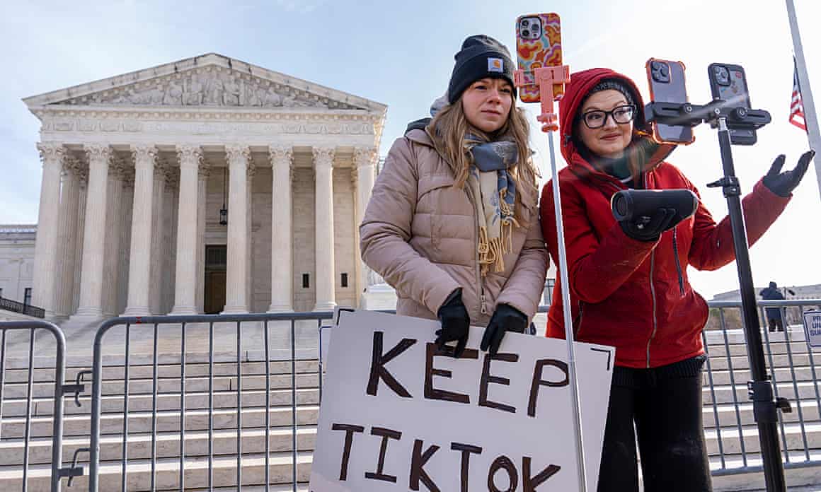 TikTok creators outside the US supreme court with a banner reading 'keep TikTok'