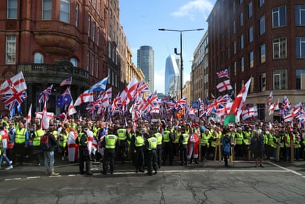 Police and protesters in London.