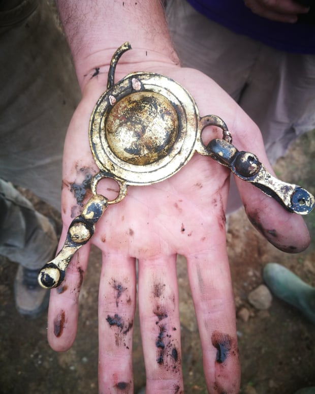 Moments after being uncovered the strap junction still shines because of the airless conditions in which it was preserved.,