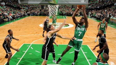 Boston Celtics rookie Jaylen Brown shoots on the Celtics’ distinctive red-oak floor.