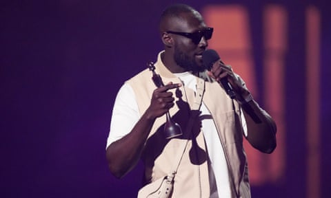 Stormzy accepts the best hip hop/grime/rap act award.