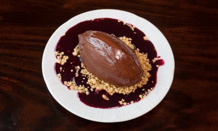 Short and sweet: chocolate and tahini mousse on a biscuit crumb, with a berry sauce