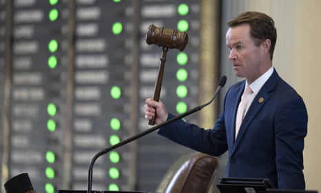 Republican Dade Phelan, the Texas house speaker, readies the gavel during a vote. 