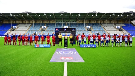 IFK Norrkoping and Pitea IF players and match officials line up ahead of last season’s Damallsvenskan game at Norrkoping in June.