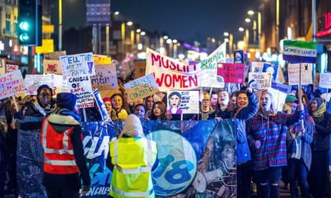 People take part in a Reclaim the Night march in February 2018 to protest against rape, sexual harassment and victim blaming