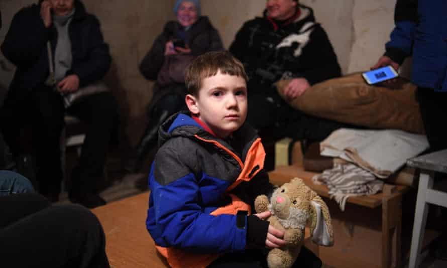 Mikhailo, aged 5, waits in an undergound shelter during a bombing alert in Kyiv yesterday.