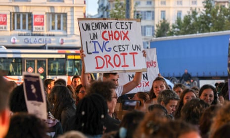 A protester holds up a placard protecting the right to abortion during a demonstration in Marseille