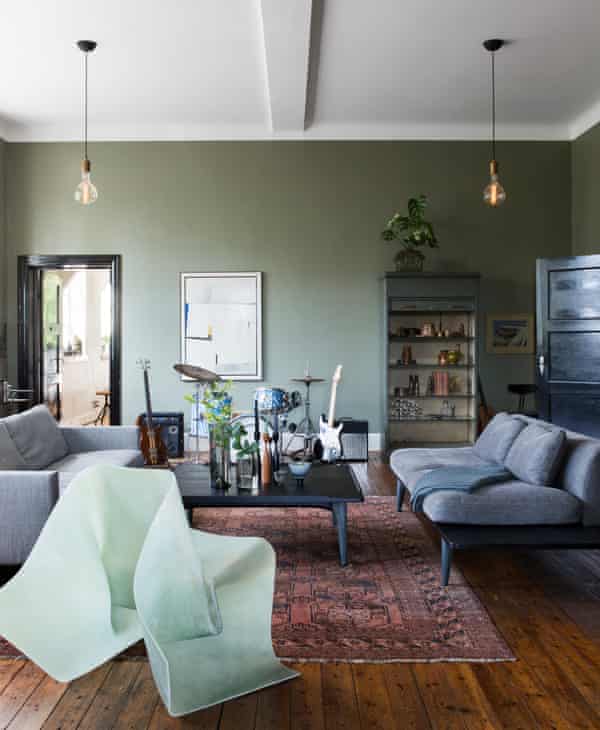 Stunning, rural home in Sweden is top of the class | Interiors 1 Walls in Green Leaf by Jotun and a Fold chair by Olivier Gregoire in the sitting room.
