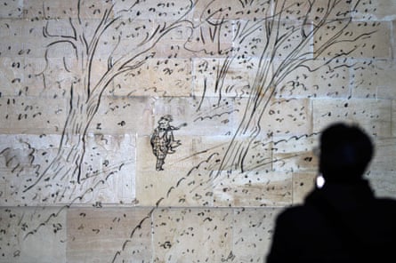 Art by Jean-Jacques Sempé projected at night on to the Reformation Wall in Geneva, on 24 March 2021.