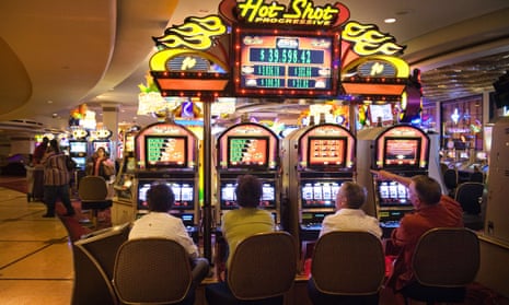 Gamblers at a casino in Las Vegas. The ‘Australian-format machine’ as it is known in the US now makes up a large percentage of the gambling machines on offer at US casinos.