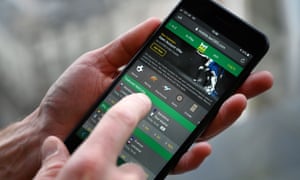 Man betting on smartphone