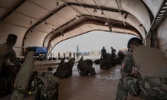 FILES-NIGER-FRANCE-MILITARY-DIPLOMACY<br>(FILES) French soldiers of the 2e Regiment Etranger de Parachutistes (2eREP - 2nd Foreign Parachute Regiment ) and Nigerien soldiers prepare for a mission on the French BAP air base, in Niamey, on May 14, 2023. French troops will begin withdrawing from Niger "this week", Paris said on October 5, 2023, after a falling-out with the military in power since a July coup. (Photo by ALAIN JOCARD / AFP) (Photo by ALAIN JOCARD/AFP via Getty Images)
