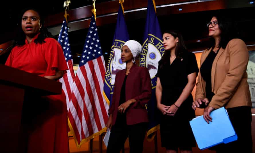 Representatives Ayanna Pressley (D-MA) speaks as, Ilhan Omar (D-MN)(2L), Rashida Tlaib (D-MI) (R), and Alexandria Ocasio-Cortez (D-NY) look on.