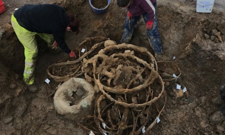 Bent iron tyres and a cauldron