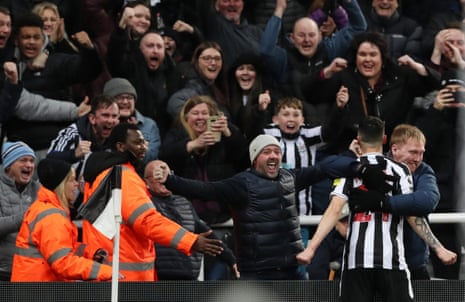 Almiron celebrates with fans.