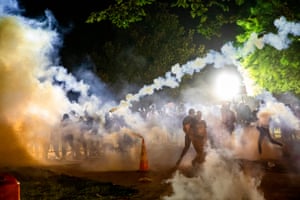 Teargas rises during a demonstration outside the White House over the death of George Floyd, on Sunday.