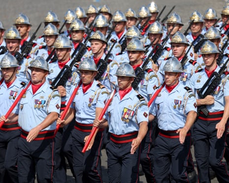 Members of the firefighter brigade of Paris parade during the annual Bastille Day military parade on the Champs-Elysees Avenue in Paris.