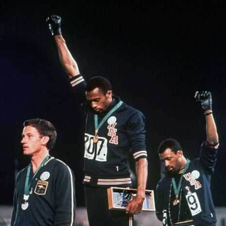 Tommie Smith (centre) with John Carlos (left) and Peter Norman at the Mexico Olympics in 1968.