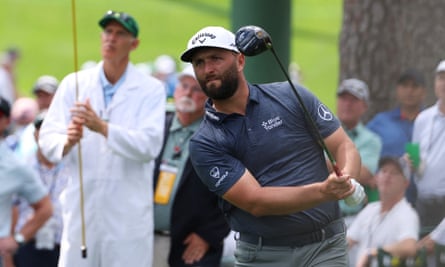 Jon Rahm watches his tee shot on the 17th.