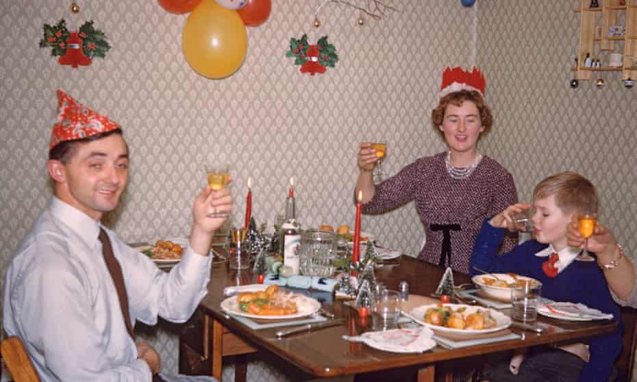 Parents and six-year-old son celebrating Christmas Dinner, 1958
