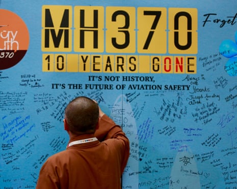 Visitors write messages at and event in Petaling Jaya, Malaysia, last March to mark the 10th anniversary of the disappearance of flight MH370.
