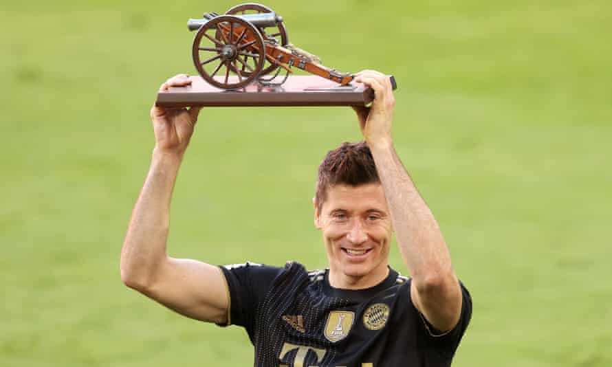 Bayern Munich’s Robert Lewandowski with the Bundesliga top scorer award after his side’s 5-2 win over Augsburg. 