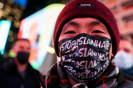man wears mask that says ‘stop asian hate’