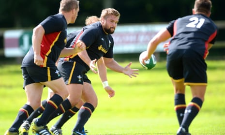 Tomas Francis, centre, takes part in training as Wales prepare for the World Cup warm-up match against Ireland