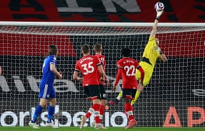 Southampton keeper Alex McCarthy tips the ball over the bar.